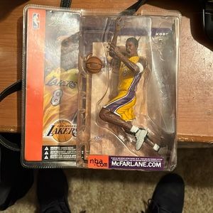 Brand new McFarlane Kobe Bryant, and number eight Laker jersey collectible